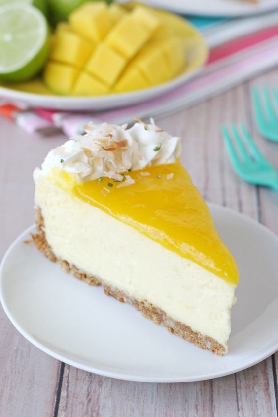 This Mango Lime Cheesecake is rich, creamy and bursting with tropical flavors!: